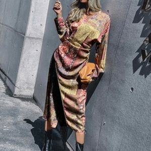 Silk wrap dress with fringe